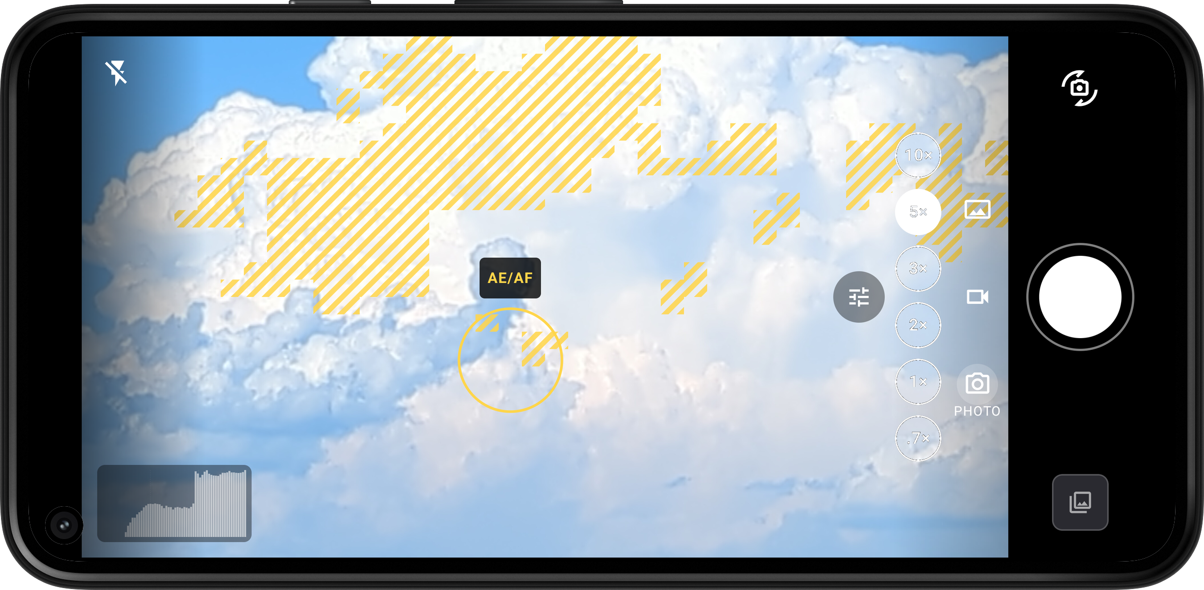 Halation viewfinder showing a cloudy sky with yellow zebra stripes overlaying the blown-out highlights.