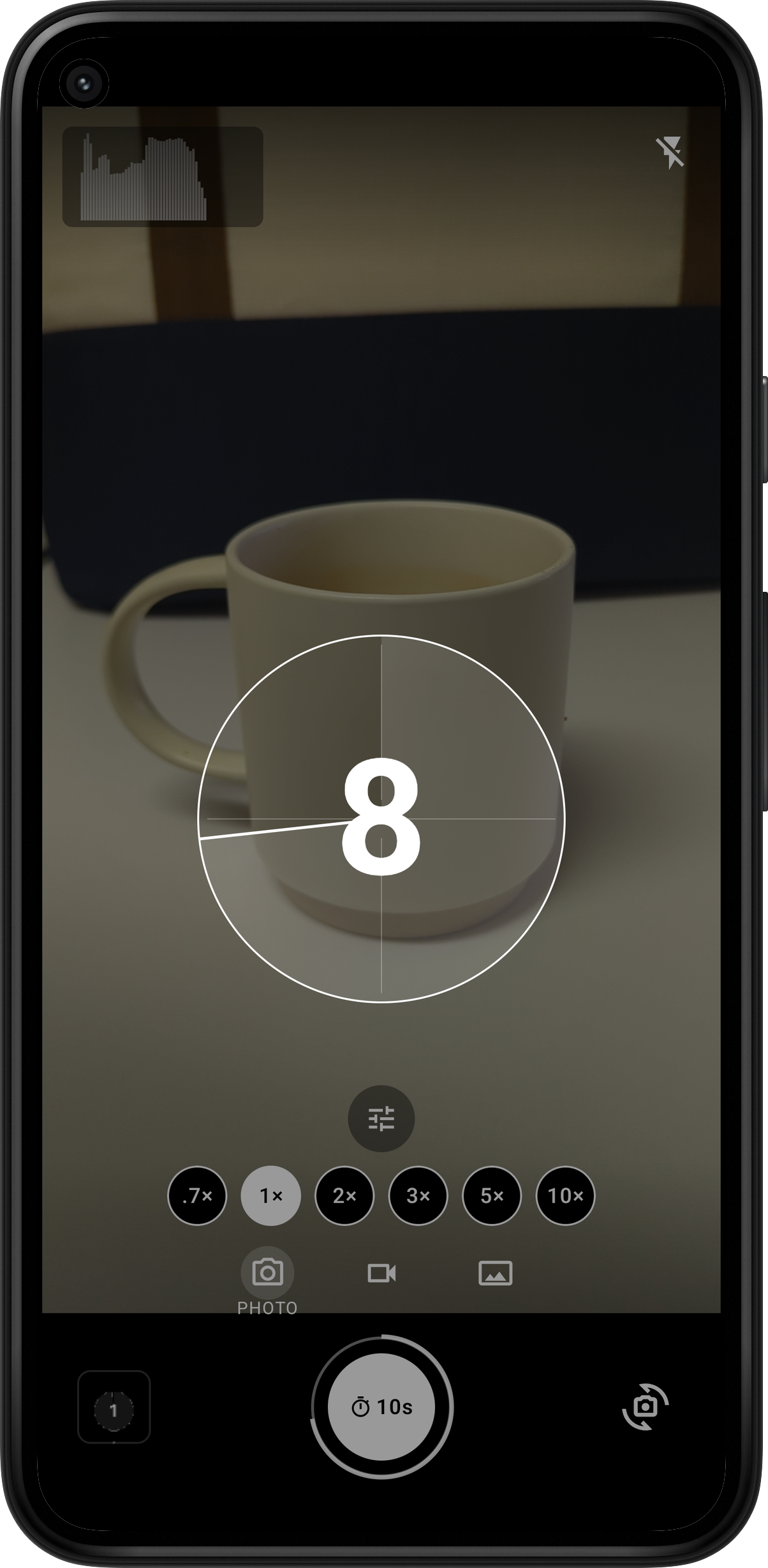 Halation's self-timer countdown showing a large '8' inside a film-leader-style ring over a photo of a coffee mug.